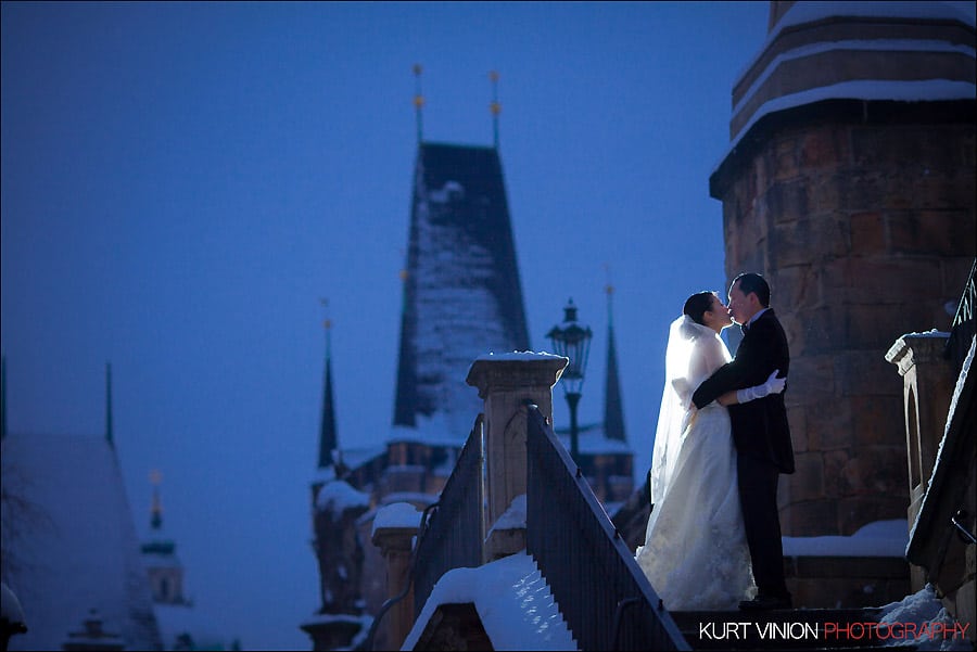 Prague pre wedding photography / Helen & CY winter pre wedding portraits at the Charles Bridge