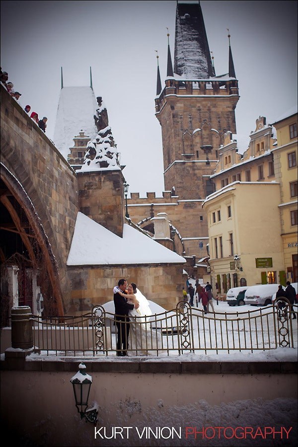 Prague pre wedding photography / Helen & CY winter pre wedding portraits at the Charles Bridge