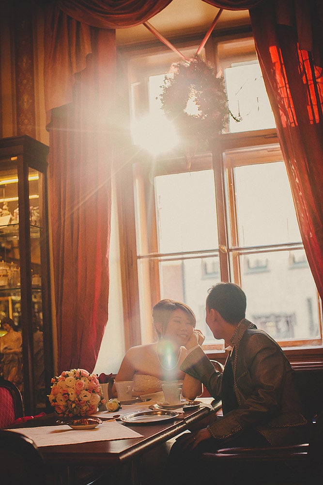 Prague portraits / Sandy & Jimmy / wedding portraits inside the Cafe Mozart overlooking Old Town Square