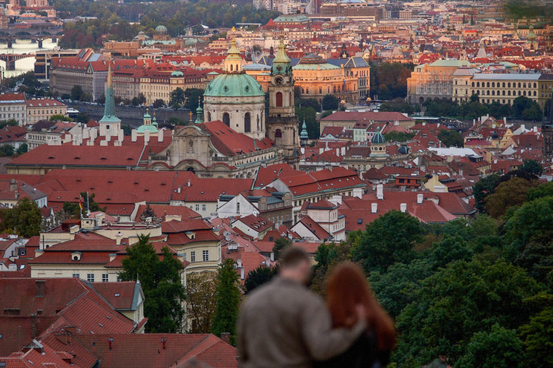 The fading light of an Autum day striking the Old Town as Max and Bryanna look on.